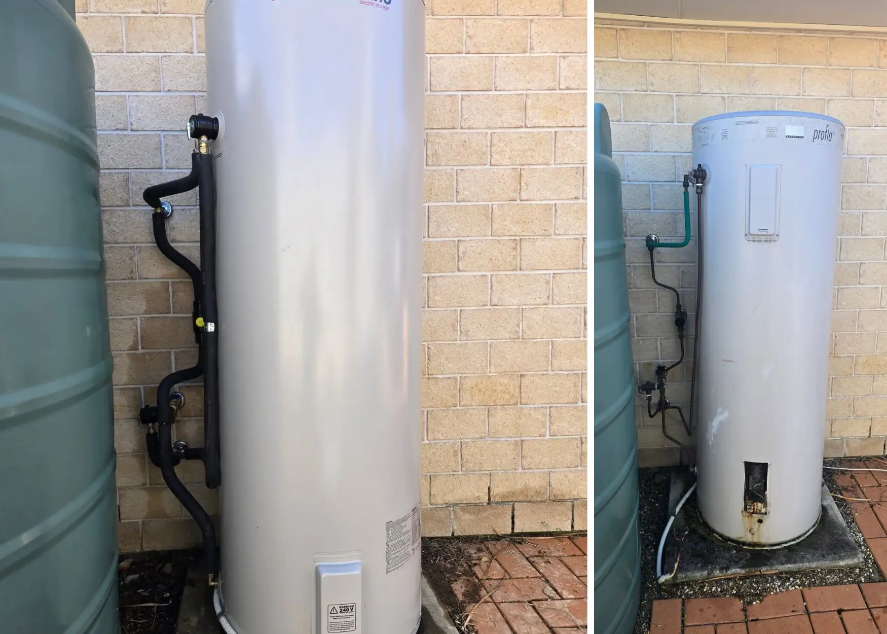 Two outdoor hot water tanks against a brick wall.
