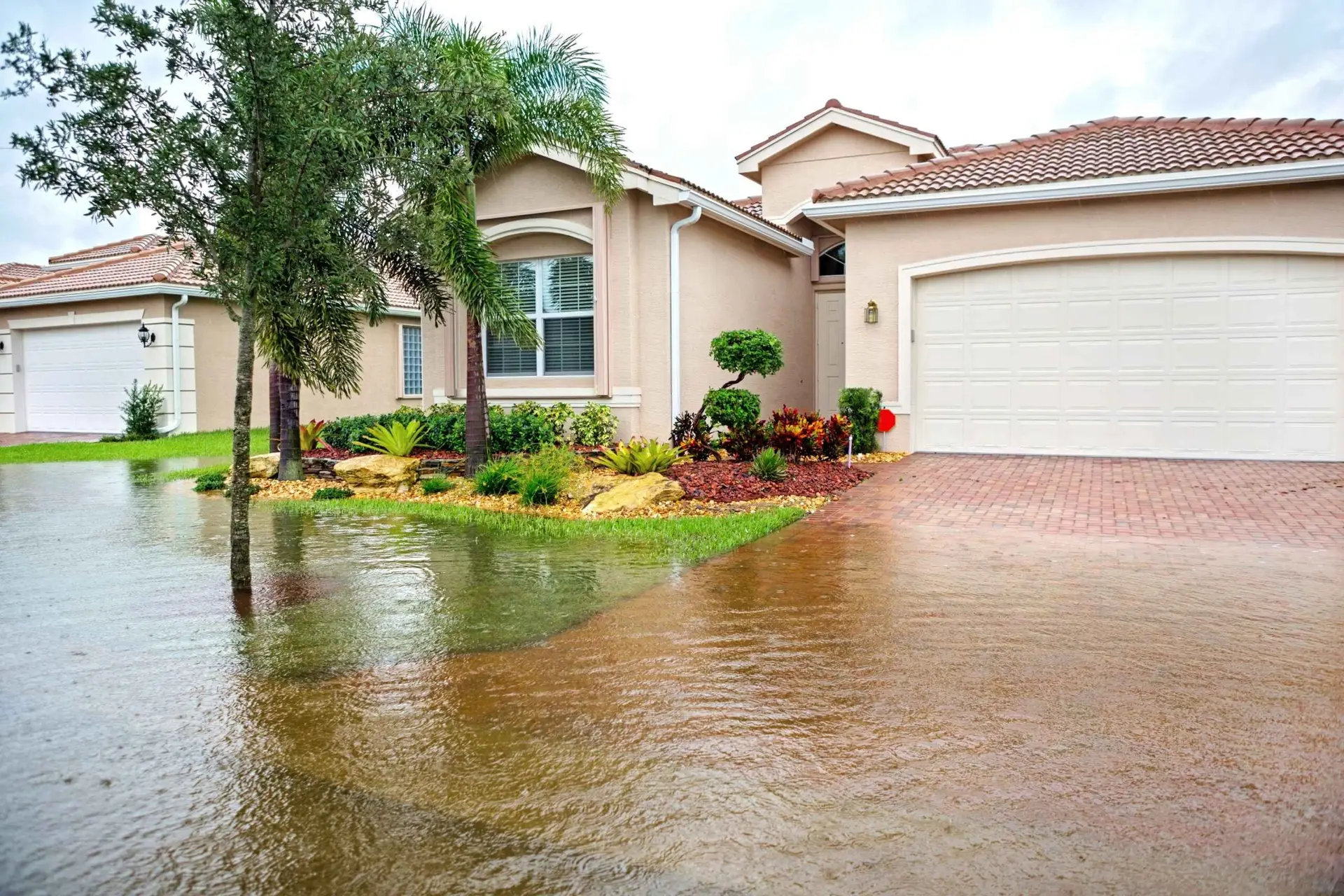 Brisbane home yard flooding caused by blocked stormwater drainage during heavy rain